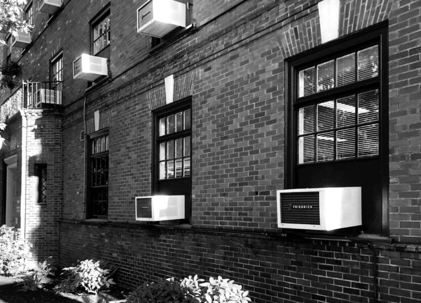 Window AC units in windows of a building