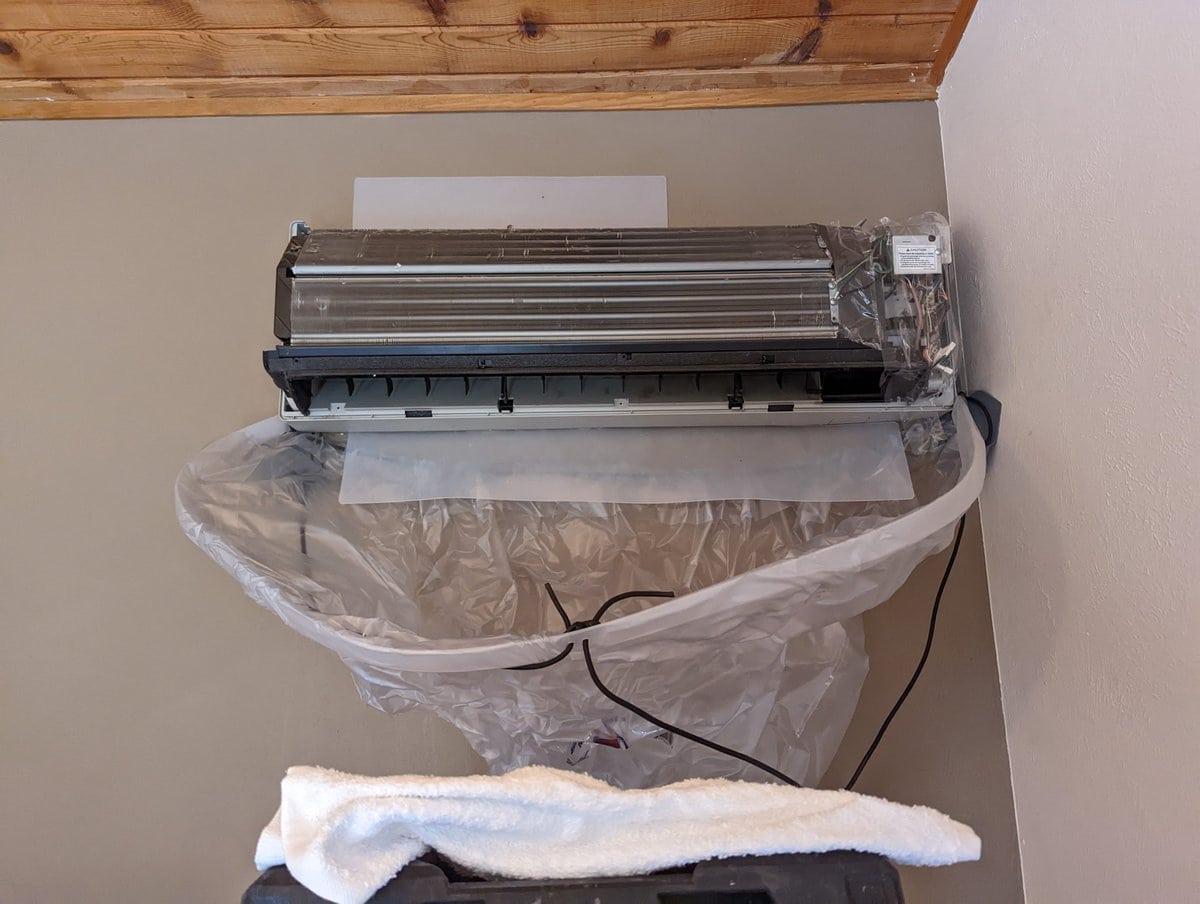 Cleaning a wall mounted split ac