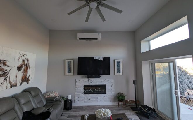A room with a wall-mounted heat-pump system